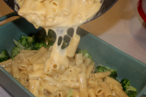 Add the pasta over the top of the broccoli.