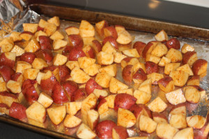 Toss the potatoes in olive oil and spices.