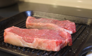 Place the steaks on a very hot grill pan.