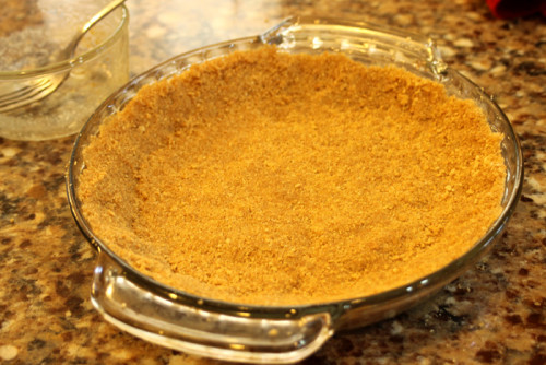 Press the graham cracker mixture in the pie plate. 